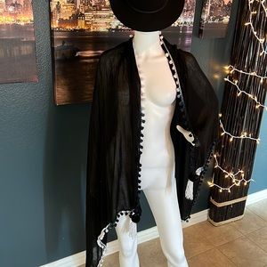 Black swimsuit cover up by Echo